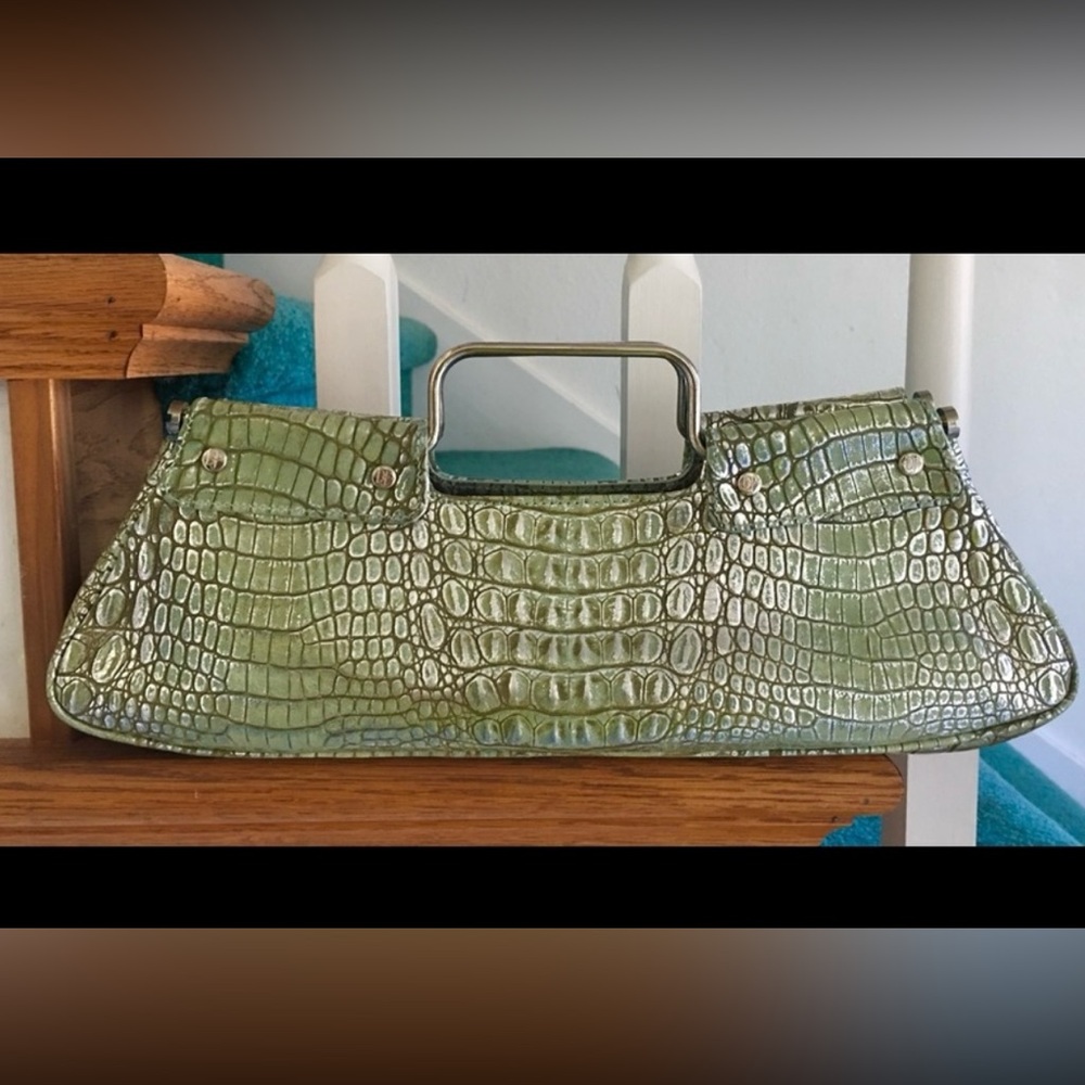 Donald pliner couture bag. Used 1x in runway show. All used bags are 40/80%
